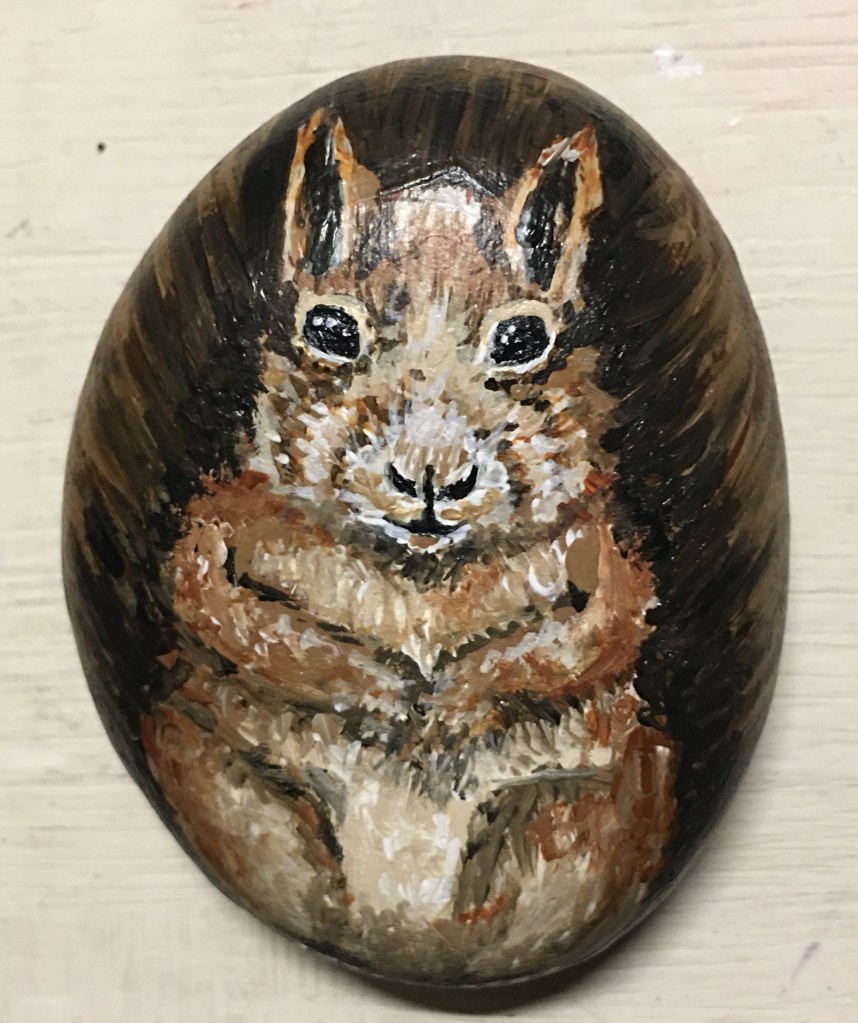 Squirrel rock painting